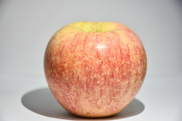 red apple on a black background