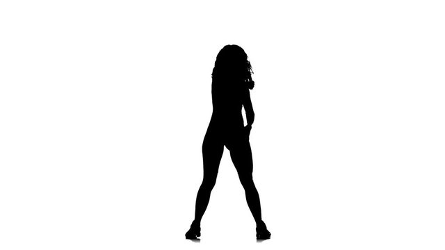 black silhouette on a white background, young beautiful girl performing energetic dancehall, street dance, latin dance, slow motion