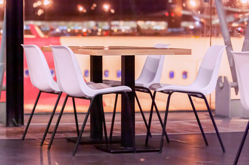 Cafe zone at the airport at night