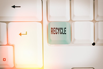 Conceptual hand writing showing Recycle. Concept meaning ocess of converting waste materials into...