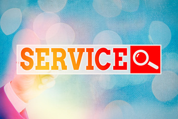 Conceptual hand writing showing Service. Concept meaning valuable action or effort performed to...