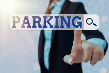 Writing note showing Parking. Business concept for leaving a vehicle in a particular place for a...