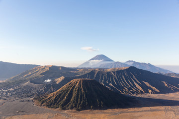 Fototapeta premium On the right side of the Bromo volcano is the Batok volcano. It is a beautiful view of Indonesia. The farthest away is the Semeru volcano.
