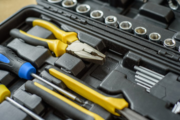 Fototapeta premium a tool kit in a suitcase to repair something.