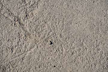 Background image of cracked concrete slab surface