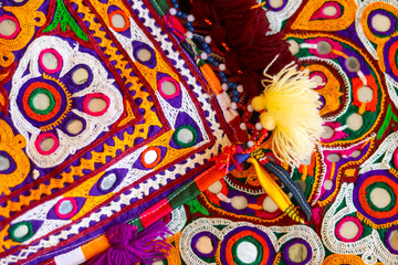 Mirrored embroidery work typical of the Aahir tribe in Gujarat,india,Rajeshthan India embroidery close up view,handwork embroidery,selective focus on handmade embroidery. Traditional Indian handmade e