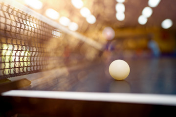 Table tennis ball on table on blurred background for player indoor