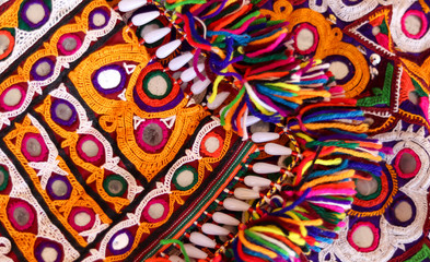 Fototapeta premium Patchwork quilt in kutch Gujarat india,needlework embroidery art work,as a kind of needlework, creativity and art.best indian traditional embroidery art. Threads for embroidery,selective focus