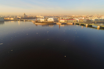 Arrow of Vasilyevsky Island in a city panorama on a sunny April morning (aerial photography). Saint-Petersburg, Russia - 342632898