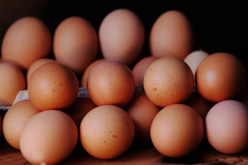 Close up eggs on wooden table background 