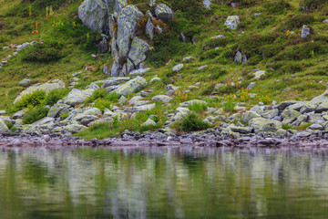 Summer scenery and glacier landscape in the Alps, with beautiful cumulus clouds
