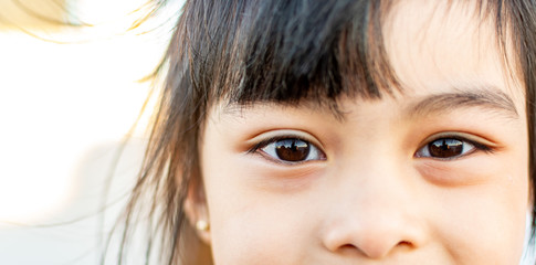 Closeup shot of child eyes with clear and shinny reflection. Eye care concept