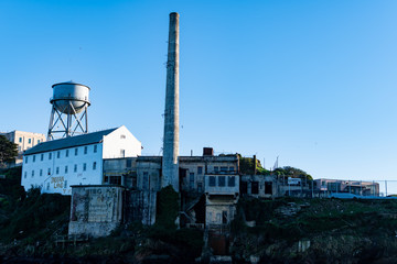 Power plant, Water Tower and the Storehouse warehouse at Alcatraz Island Prison, San Francisco California USA, March 30, 2020