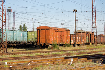 Fototapeta na wymiar Kharkiv, Ukraine - August 23, 2018: Cargo wagons parked at the railway station Osnova, in Kharkiv, Ukraine