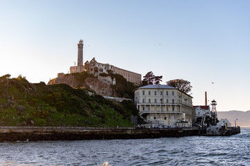 Lighthouse, barracks apartment and shipdock  at Alcatraz Island Prison, San Francisco California...