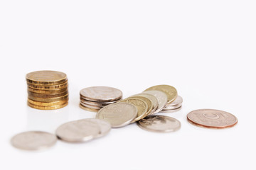 Scattered Russian coins on a white background. Unemployment and poverty amid the coronavirus pandemic. World financial crisis.