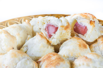 Sausage rolls. Puff pastry wrapped around a sausage and cheese