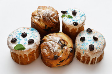 Easter cake and cruffins on white background