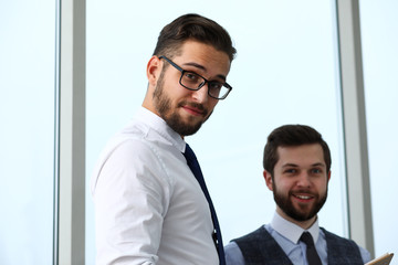 Fototapeta premium Group of modern businesspeople in office debate on financial issue hold in arms documents portrait. Success assessment human resources data analysis person