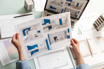 Interior designer working with a kitchen visual renderings in a design bureau. - 342651690
