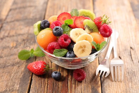fruit salad with berry fruit, banana, melon