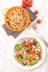 pasta salad with broccoli, radish and tomato