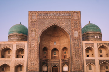 Fototapeta na wymiar Middle Asia. Uzbekistan Bukhara. Summer. Eastern mosque. Poi Kalyan complex. The main building. 