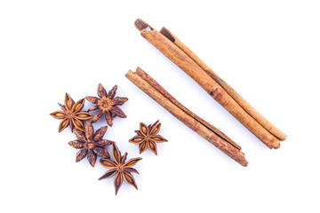 cinnamon and star anise on white background.