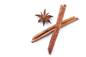 cinnamon and star anise on white background.