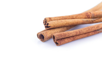 cinnamon on white background front view close up.