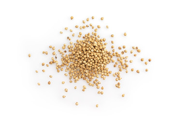 coriander seeds top view on white background.