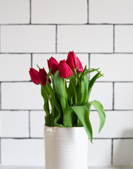 Red tulips easter decoration in a home. Spring concept