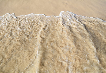 Sand washed with water from the sea.