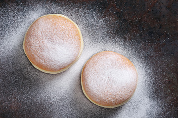 Doughnuts with icing sugar
