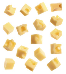 Set of delicious cheese cubes on white background