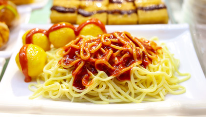Pasta in tomato sauce in a cafe.