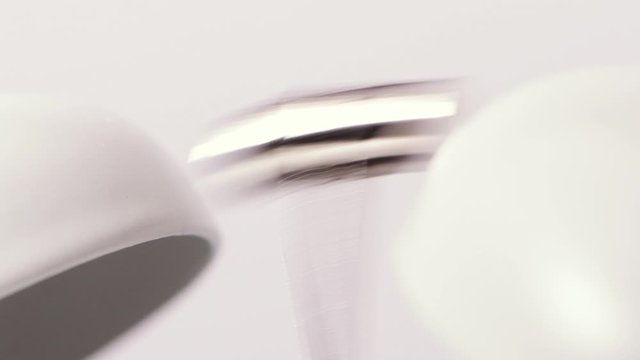 Close up of alarm clock that triggers the alarm in the morning. Time concept. Slow motion.