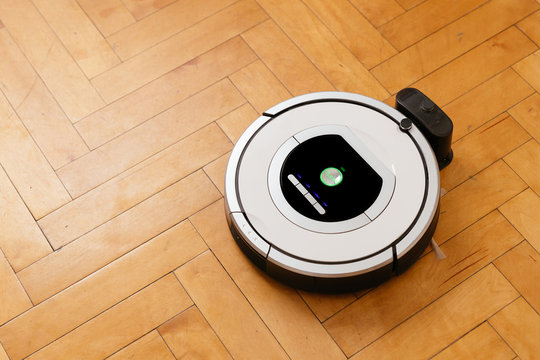 Automatic vacuum cleaner. Wireless Vacuum Cleaner. Smart cleaning technology isolated. Round. Top view.