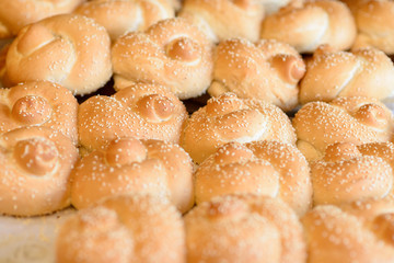 Fresh Small Challah for sale at local city bakery. Challah special bread in Jewish cuisine, usually braided and typically eaten on ceremonial occasions such as Sabbath.