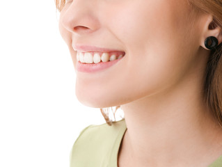 Fototapeta premium Young woman with healthy teeth on white background, closeup