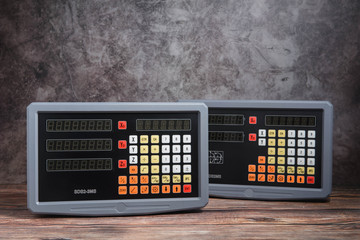 Digital read out on the wood backgroud.