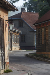 Street with residential houses in the old town of Cesis, Latvia