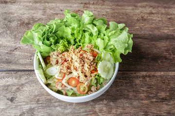 Tuna salad in white bowl.