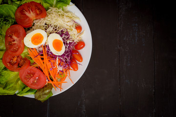 Vegetables Salad on black  wooden  background