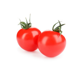 Fresh ripe organic tomatoes isolated on white