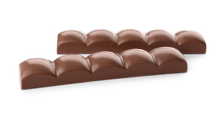 Mini milk chocolate bars isolated on white