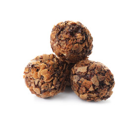 Delicious chocolate candies with waffle crumbles isolated on white