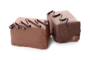 Delicious milk chocolate candies isolated on white