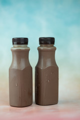 Tasty dark cocoa milk in plastic bottle