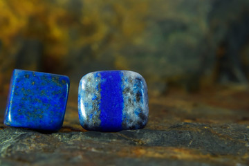 Lapis Is a beautiful natural gemstone on a wooden floor
